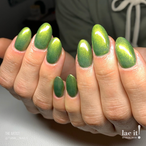 en Vogue Lac It! Holly deep green with a fine gold shimmer UV/LED gel nail polish for professional nails and extensions on almond manicure