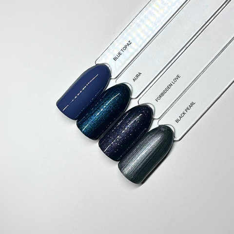 en Vogue Lac it! forbidden-love, deep grey-blue shimmer UV/LED gel polish for professional nails and extensions shown on swatch sticks with Blue Topaz, Aura and Black Pearl