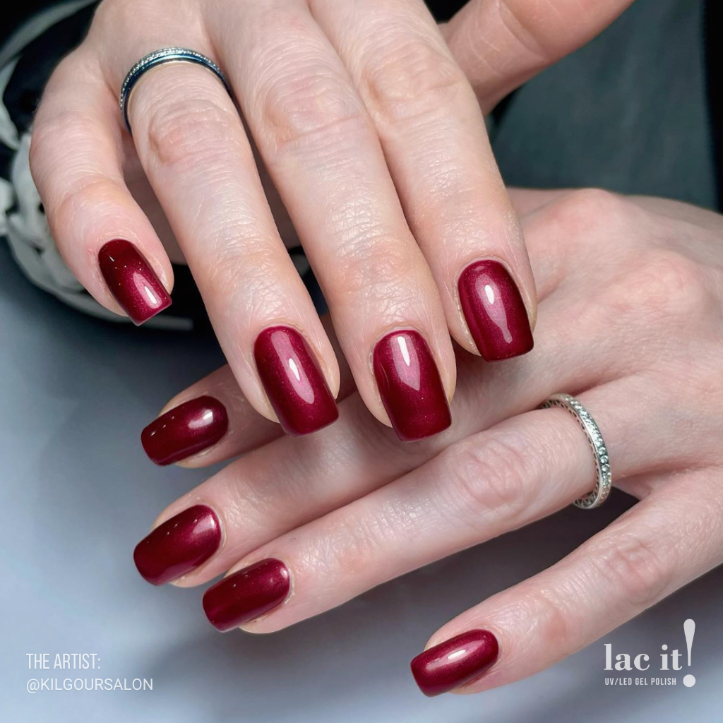 en Vogue Lac It! 50 shades of red deep burgundy red with a pearlescent finish UV/LED gel nail polish for professional nails and extensions shown on nails