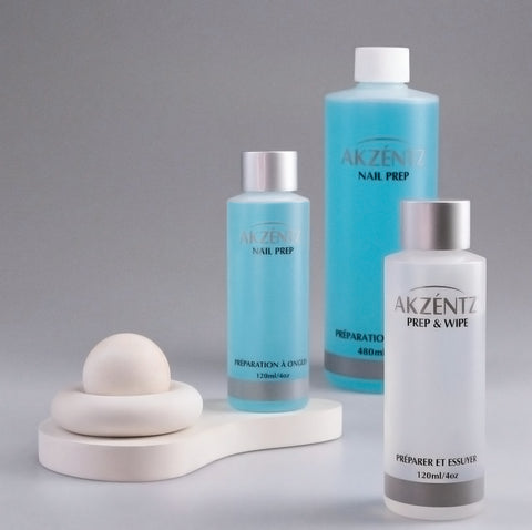 Akzentz nail prep and wipe products on a gray background