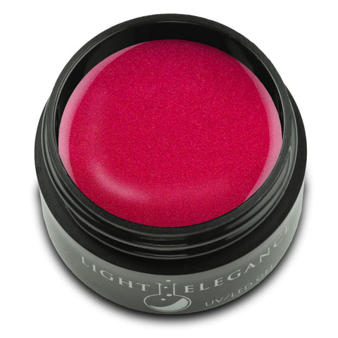 This fuchsia meets red has a shimmery satin finish. This color leans a bit more towards red, but the tiny bit of pink gives it a festive glow. A great winter red for any occasion!

Sexy Soirée, UV/LED Color Gel, 17 ml

Coverage: Opaque
Effect: Shimmer
