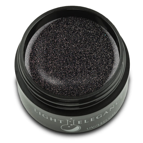 This extremely fine black glitter is laced with tiny chrome pieces. This black Champagne is perfect for winter parties and sparkling the night away!

Tall, Dark and Handsome UV/LED Glitter Gel, 17 ml.

Coverage: Opaque
Effect: Glitter