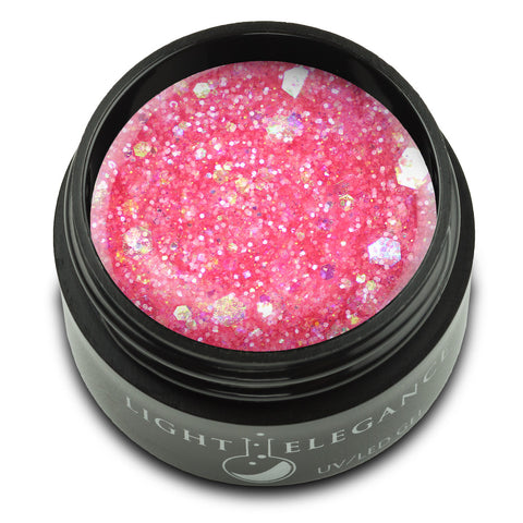 This beautifully complex shade is a delicate mixture of iridescent and pearl glitters. Small melon-pink glitters combine with chunky iridescent pieces and just a sprinkle of baby pink for a happy, bright shade perfect for lightening up any set. This shade shines brightest when applied over white or light colors.

A Peony for Your Thoughts, UV/LED Glitter Gel, 17 ml

Coverage: Semi-Opaque/Semi-Sheer
Effect: Glitter