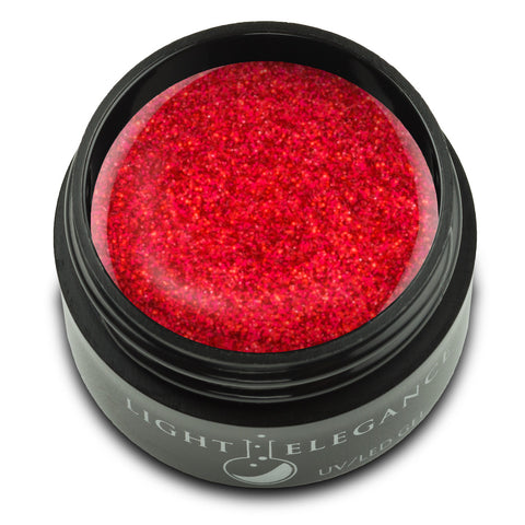 A happy, bright red featuring fine pieces of red glitter that capture the light for a dazzling, twinkly appearance. Try two thin coats for a bold, full coverage look.

Richy & Bitchy, UV/LED Glitter Gel, 17 ml

Coverage: Semi-Opaque/Semi-Sheer
Effect: Glitter
light elegance glitter gel canada